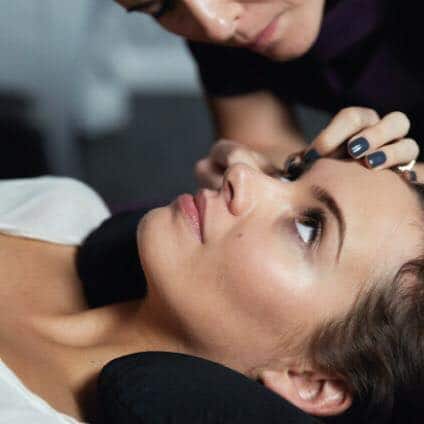 Nouveau Lashes LVL Lash Lift now at The Spa Therapy Room. Woman having LVL lash lift by beauty therapist